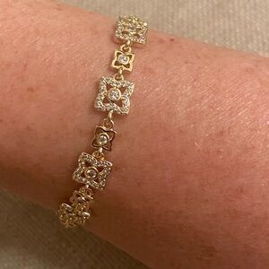 Gold CZ floral bracelet 7.5”, NWOT